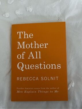 The Mother of All Questions by Rebecca Solnit - Orange Paperback
